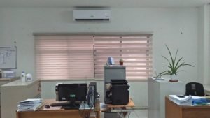Amjolce Installed Elegant Combi-Roller Shades for Government Office